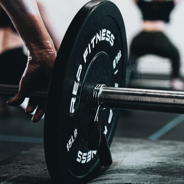 Group fitness class in a modern studio setting